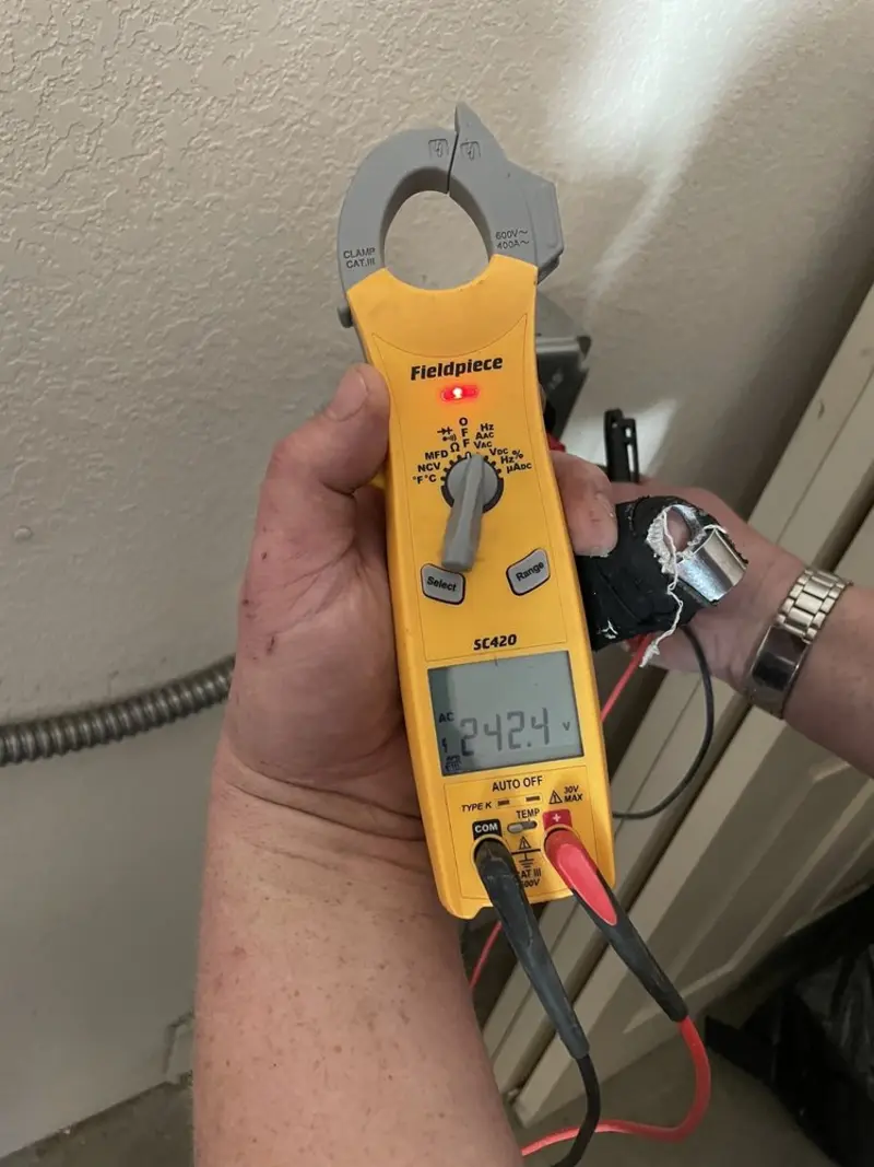 Voltage testing with clamp meter during Outlet Installation in Gatesville